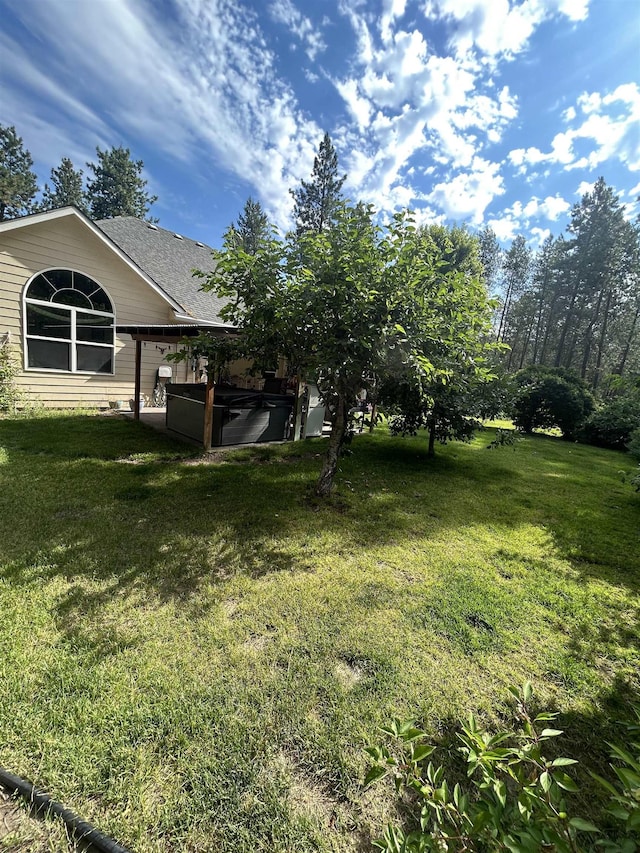 603 W Dennison-Chattaroy Rd, Deer Park, WA 99006 - view of green lawn with a hot tub