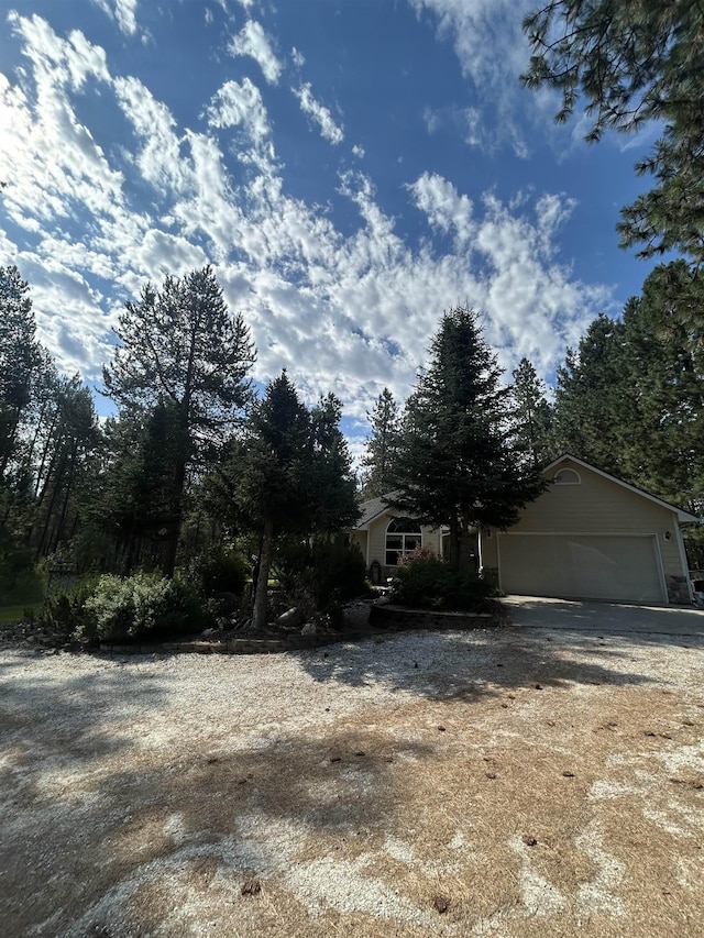 603 W Dennison-Chattaroy Rd, Deer Park, WA 99006 - view of front of home featuring an attached garage and driveway