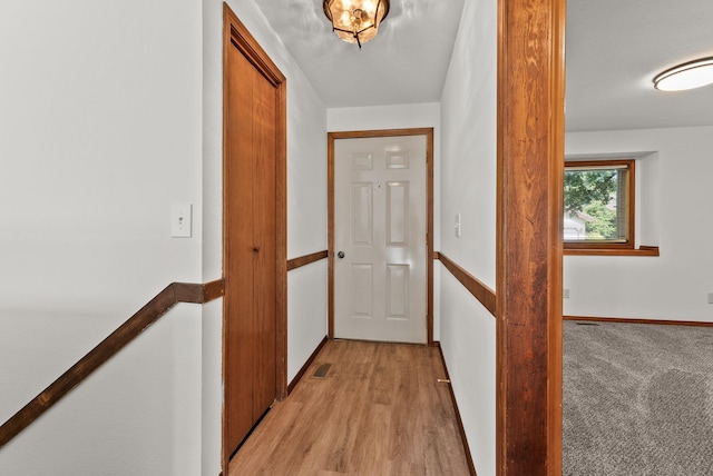 3707 S Alder Ct, Spokane, WA 99223 - hall featuring light wood-style flooring and an upstairs landing