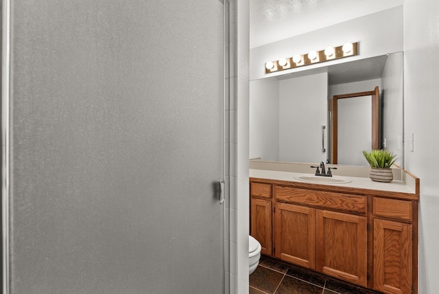 3707 S Alder Ct, Spokane, WA 99223 - full bathroom with vanity, tile patterned flooring, and a shower with door