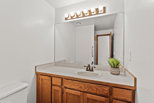 3707 S Alder Ct, Spokane, WA 99223 - bathroom featuring toilet and vanity