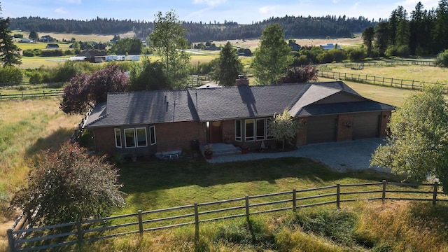 17207 N Mt Spokane Park Dr, Mead, WA 99021 - view of front of property featuring a garage, brick siding, a view of rural / pastoral area, and decorative driveway