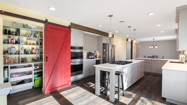 17207 N Mt Spokane Park Dr, Mead, WA 99021 - kitchen featuring stainless steel appliances, gray cabinetry, light countertops, dark wood-style floors, and recessed lighting