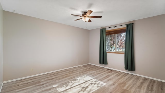 17207 N Mt Spokane Park Dr, Mead, WA 99021 - empty room with light wood-style flooring and ceiling fan