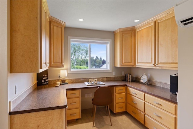 639 N Riverpoint Blvd Unit J201/J202, Spokane, WA 99202 - home office featuring built in desk, a wall mounted air conditioner, and recessed lighting