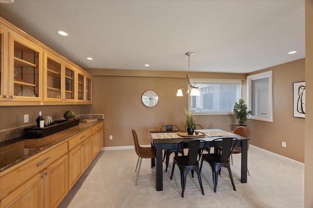 639 N Riverpoint Blvd Unit J201/J202, Spokane, WA 99202 - dining space featuring light carpet and recessed lighting