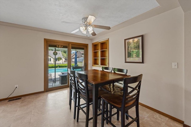 2515 E 38th Ave, Spokane, WA 99223 - dining room with a textured ceiling, built in features, and ceiling fan