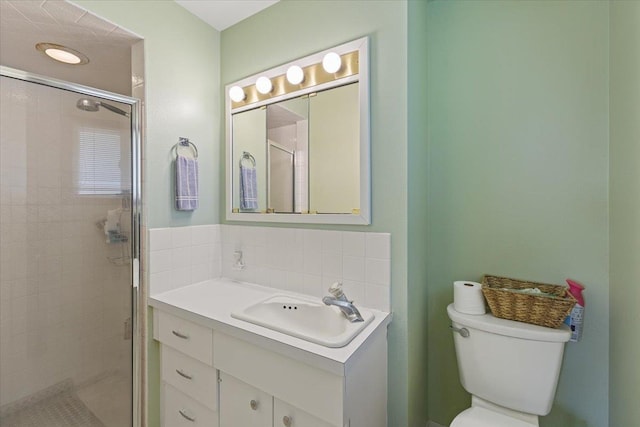 2515 E 38th Ave, Spokane, WA 99223 - full bath with vanity, a shower stall, and backsplash