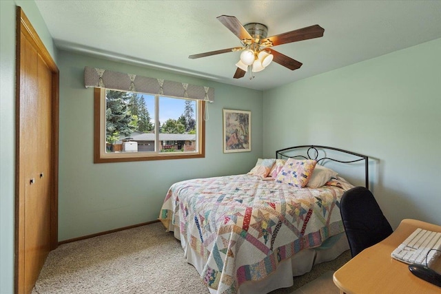 2515 E 38th Ave, Spokane, WA 99223 - carpeted bedroom featuring baseboards and a ceiling fan