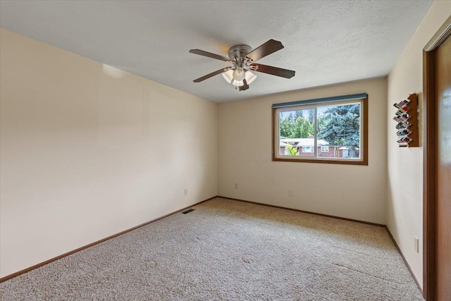 2515 E 38th Ave, Spokane, WA 99223 - empty room featuring light colored carpet and a ceiling fan