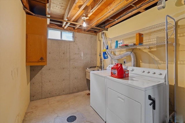 2515 E 38th Ave, Spokane, WA 99223 - washroom with washing machine and dryer and cabinet space