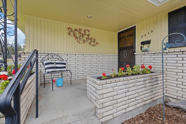 2515 E 38th Ave, Spokane, WA 99223 - property entrance featuring brick siding and a porch