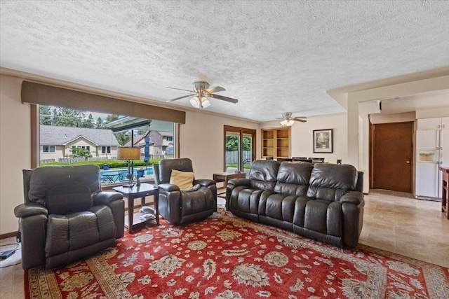 2515 E 38th Ave, Spokane, WA 99223 - living room with a ceiling fan and a textured ceiling