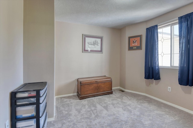 4318 N Upland Ct, Spokane Valley, WA 99216 - carpeted empty room featuring a textured ceiling and baseboards