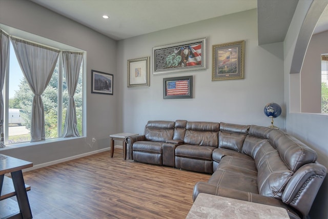 4318 N Upland Ct, Spokane Valley, WA 99216 - living area featuring wood finished floors, healthy amount of natural light, recessed lighting, and arched walkways