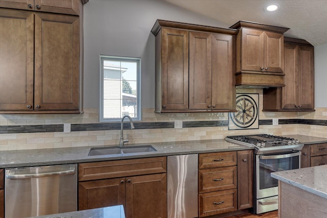 4318 N Upland Ct, Spokane Valley, WA 99216 - kitchen featuring stainless steel appliances, stone counters, tasteful backsplash, lofted ceiling, and recessed lighting