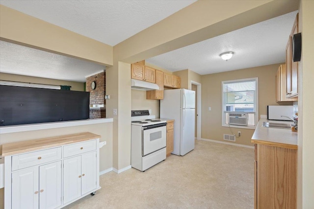 34 E Euclid Ave, Spokane, WA 99207 - kitchen with white appliances, under cabinet range hood, a textured ceiling, light carpet, and cooling unit