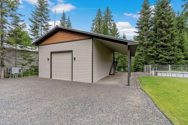 201 Dilling Ln, Cusick, WA 99119 - garage with gravel driveway and a detached garage
