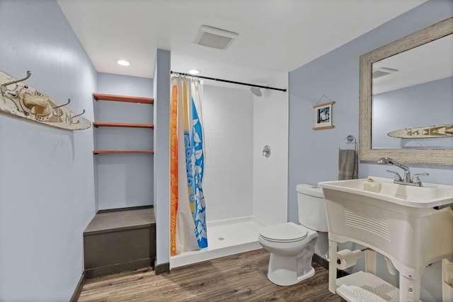 201 Dilling Ln, Cusick, WA 99119 - bathroom featuring wood finished floors and a shower stall