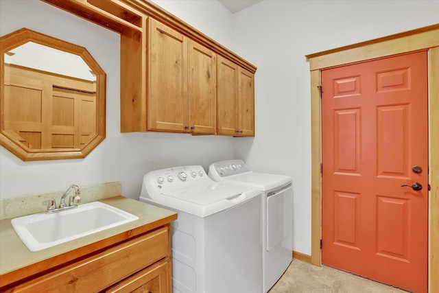 11425 N Lloyd Charles Ln, Spokane, WA 99218 - laundry room with cabinet space and washing machine and clothes dryer