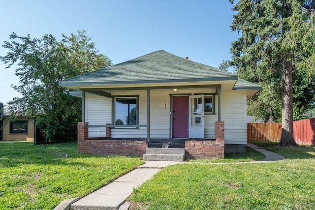 1019 E Everett Ave, Spokane, WA 99207 - bungalow with a shingled roof and a porch