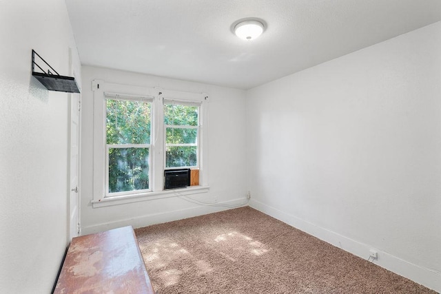 1019 E Everett Ave, Spokane, WA 99207 - carpeted spare room with cooling unit and baseboards