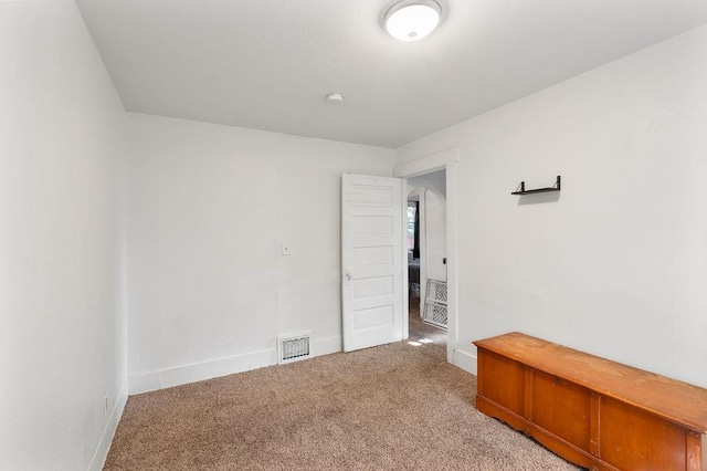 1019 E Everett Ave, Spokane, WA 99207 - unfurnished room featuring light carpet and baseboards