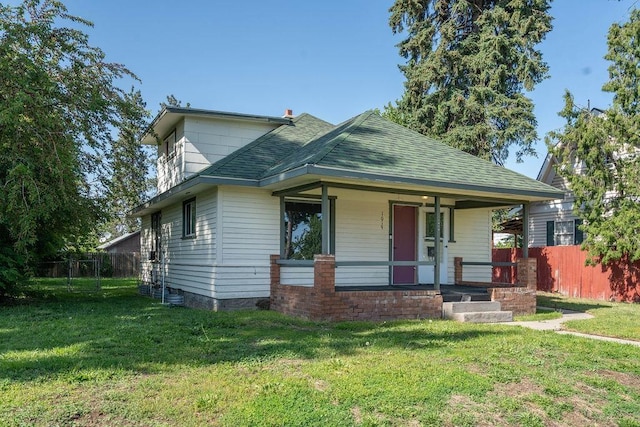 1019 E Everett Ave, Spokane, WA 99207 - view of front facade with a porch and roof with shingles