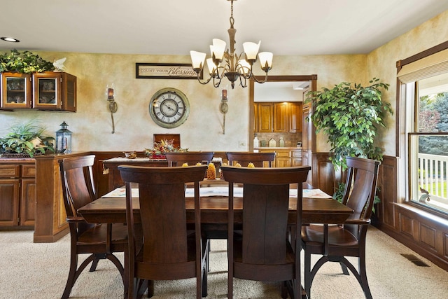 3333 N Ashton Rd, Otis Orchards, WA 99027 - dining room with light colored carpet and a chandelier