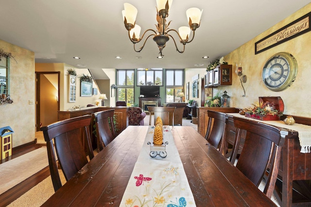 3333 N Ashton Rd, Otis Orchards, WA 99027 - dining room featuring a chandelier, wood finished floors, recessed lighting, and a fireplace