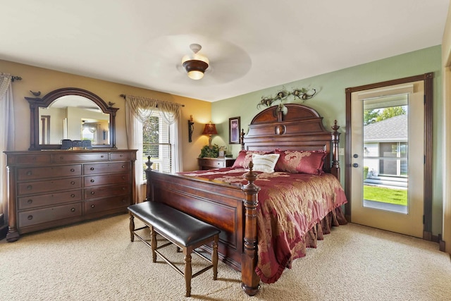 3333 N Ashton Rd, Otis Orchards, WA 99027 - bedroom with multiple windows, light carpet, a ceiling fan, and access to exterior