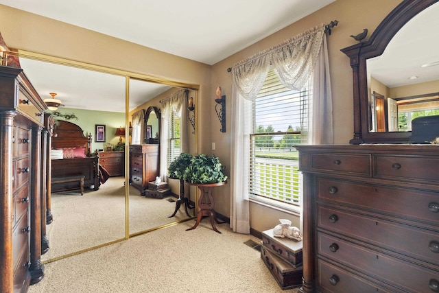 3333 N Ashton Rd, Otis Orchards, WA 99027 - bedroom with a closet, light carpet, and multiple windows