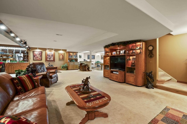 3333 N Ashton Rd, Otis Orchards, WA 99027 - carpeted living area featuring stairs and bar
