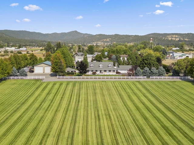 3333 N Ashton Rd, Otis Orchards, WA 99027 - view of yard with a mountain view, a detached garage, and an outbuilding
