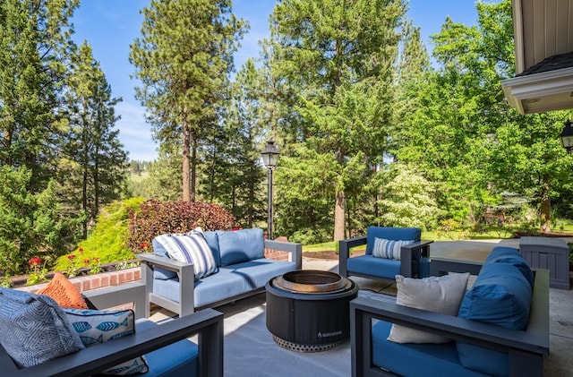 1807 E Pinegate Ln, Spokane, WA 99224 - view of patio featuring an outdoor living space with a fire pit