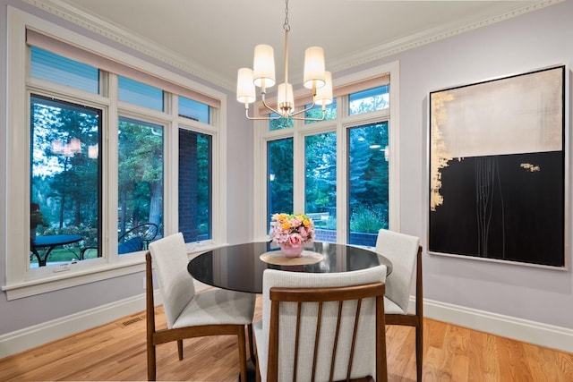 1807 E Pinegate Ln, Spokane, WA 99224 - dining room featuring a chandelier, ornamental molding, and wood finished floors
