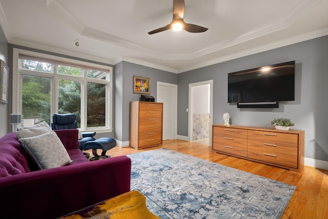 1807 E Pinegate Ln, Spokane, WA 99224 - living room with a ceiling fan, a raised ceiling, light wood finished floors, and crown molding