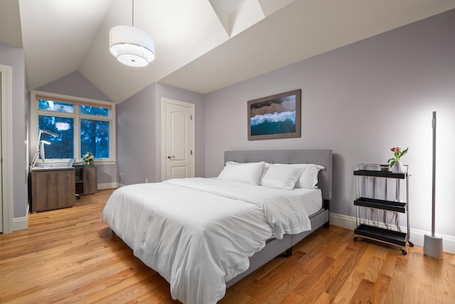 1807 E Pinegate Ln, Spokane, WA 99224 - bedroom with light wood-style flooring and lofted ceiling