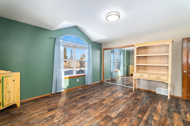 8715 W Antler Rd, Deer Park, WA 99006 - unfurnished bedroom with vaulted ceiling and dark wood finished floors