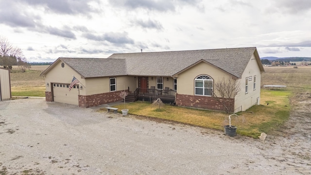 8715 W Antler Rd, Deer Park, WA 99006 - ranch-style house with brick siding, a shingled roof, and dirt driveway