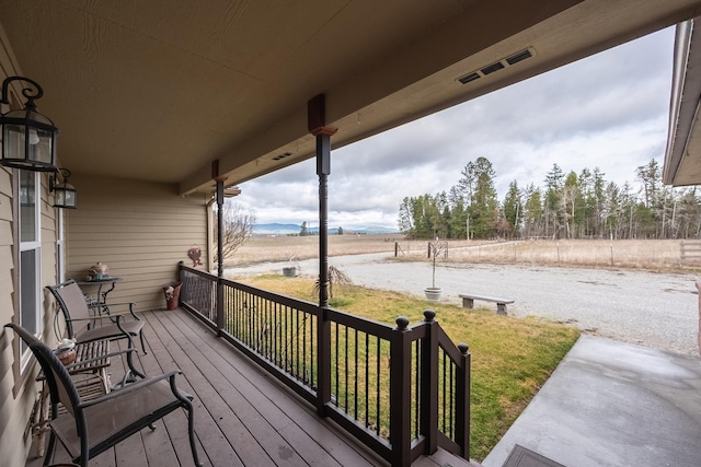 8715 W Antler Rd, Deer Park, WA 99006 - wooden deck featuring a yard