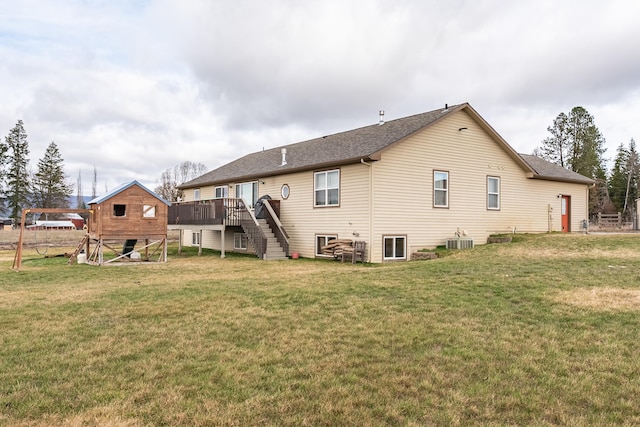 8715 W Antler Rd, Deer Park, WA 99006 - rear view of house featuring stairway, a wooden deck, a yard, and roof with shingles