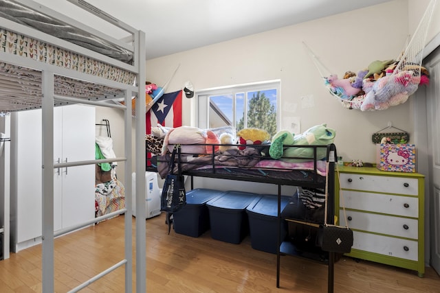 20902 S Ritchey Rd, Spokane, WA 99004 - bedroom featuring wood finished floors