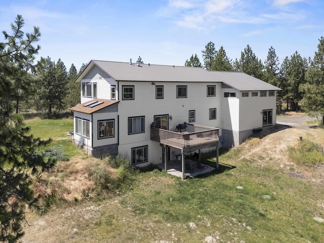 20902 S Ritchey Rd, Spokane, WA 99004 - rear view of property with a deck and a lawn