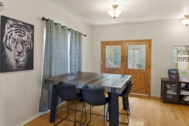 20902 S Ritchey Rd, Spokane, WA 99004 - dining room with french doors and light wood-style flooring