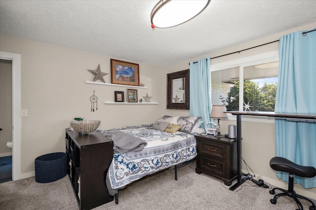 9307 E Morgan Rd, Spokane, WA 99217 - bedroom with light colored carpet and a textured ceiling