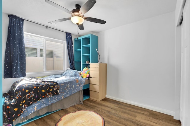 10521 W Salmonberry Rd, Cheney, WA 99004 - bedroom with wood finished floors and a ceiling fan