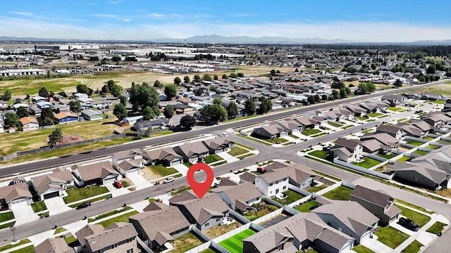 10521 W Salmonberry Rd, Cheney, WA 99004 - aerial perspective of suburban area with mountains