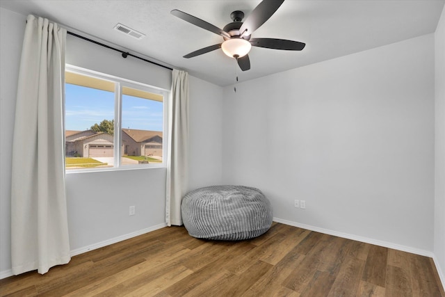 10521 W Salmonberry Rd, Cheney, WA 99004 - empty room featuring wood finished floors and ceiling fan