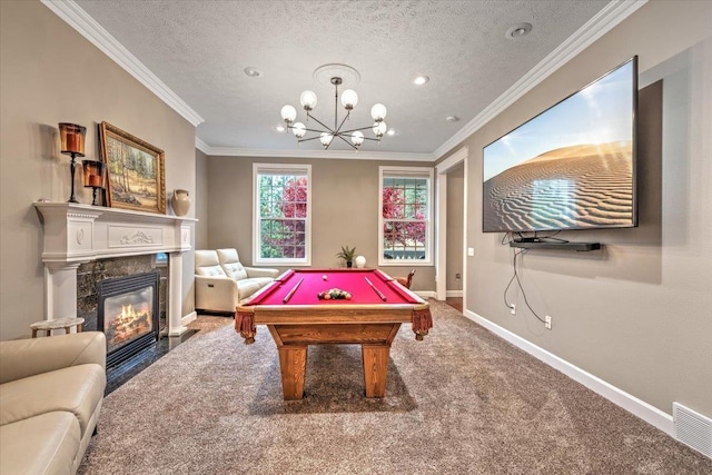 6808 S Jackson Ridge Ln, Greenacres, WA 99016 - recreation room featuring carpet floors, ornamental molding, pool table, a chandelier, and a premium fireplace
